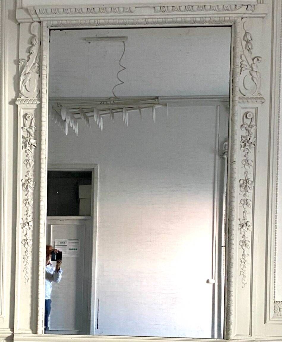 Louis XVI style mirror in wood and carved stucco 20th century
