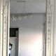 Louis XVI style mirror in wood and carved stucco 20th century