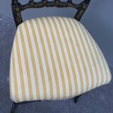 Napoleon III chair late 19th in blackened wood with gilded patterns