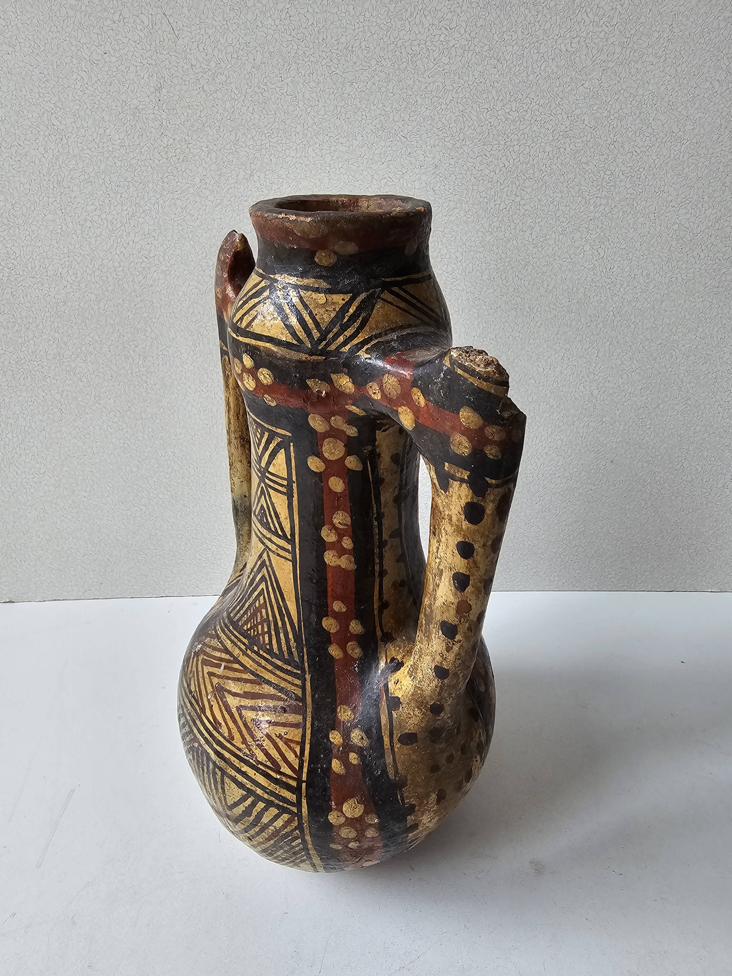 Kabyle Algerian pottery oil jar with polychrome geometric decorations