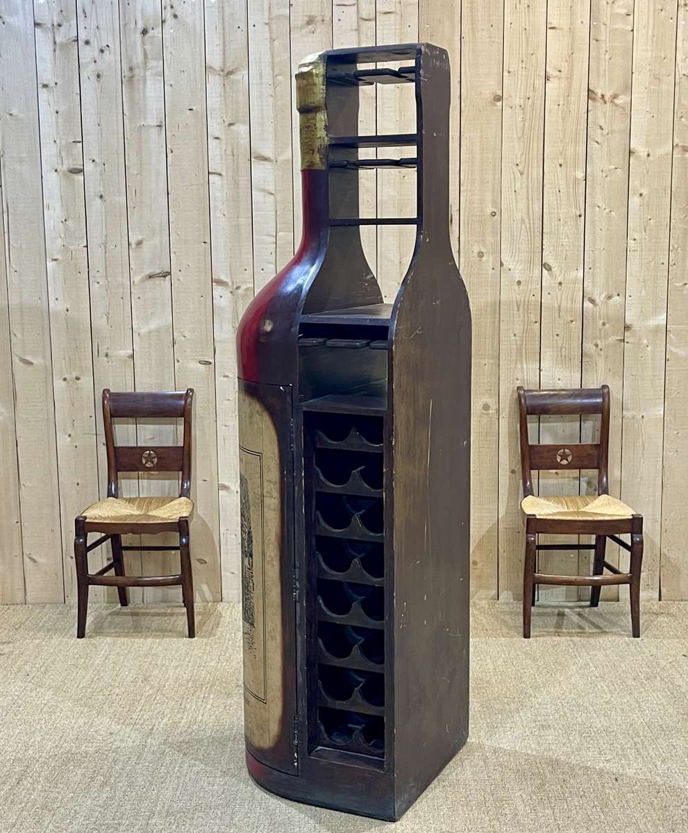 Advertising bar furniture in the shape of a giant wine bottle 90s