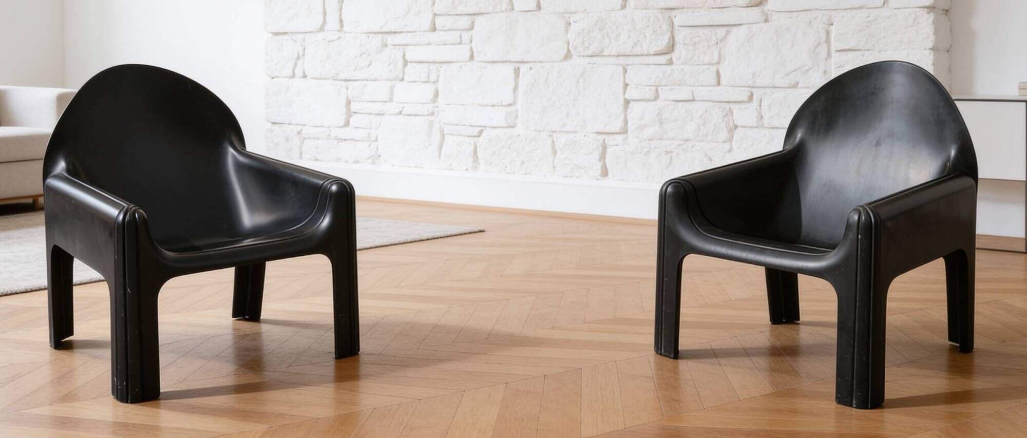 Pair of Gae Aulenti armchairs