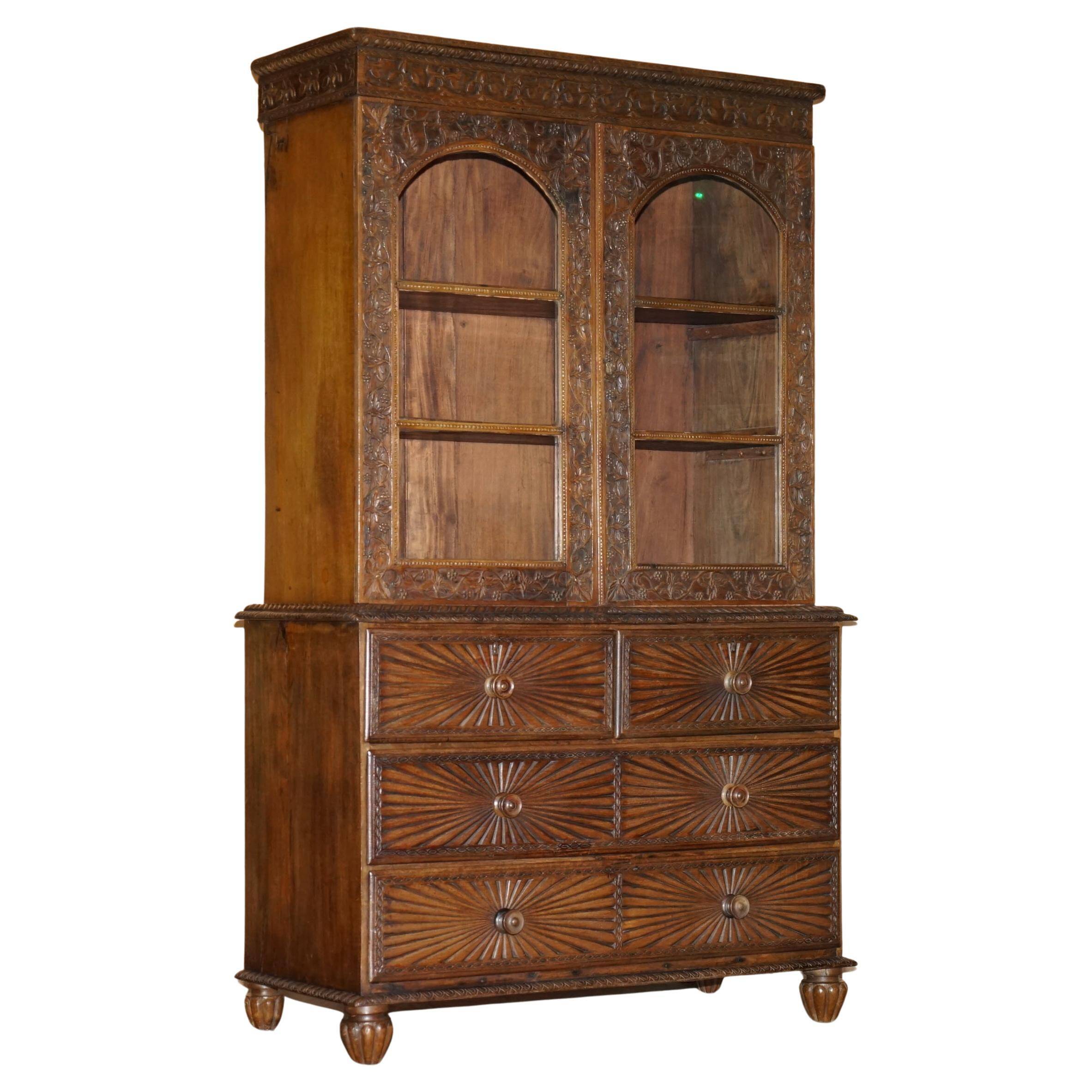 19th-century Anglo-Indian colonial hardwood library on a chest of drawers.