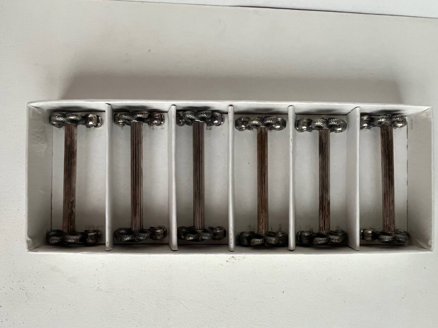6 silver metal knife holders