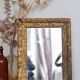 Antique mirror in gilded wood