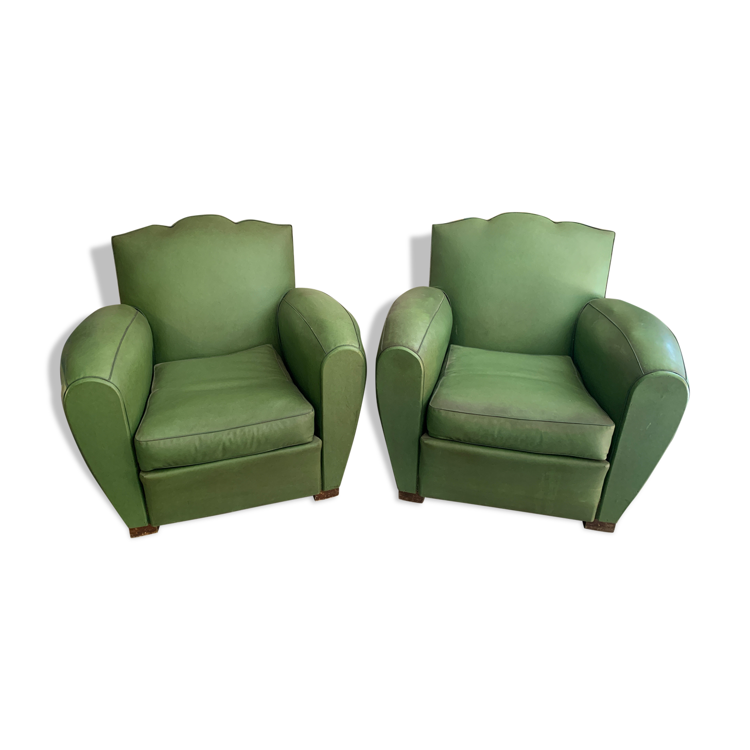 Pair of mustache club armcairs in green skai