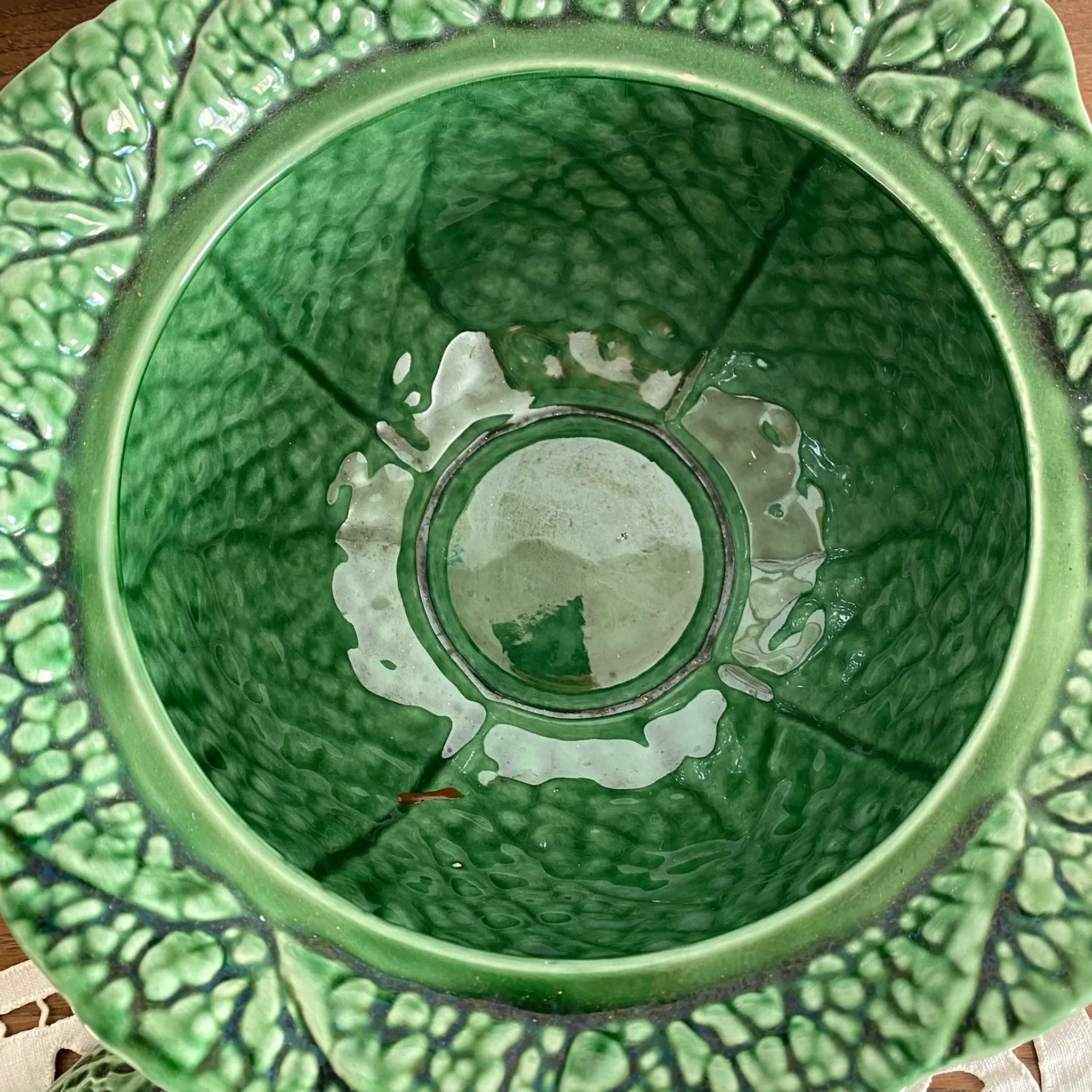 Large soup tureen in earthenware with a cabbage design, along with a dish and spoon.
