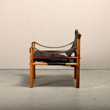 Fauteuil lounge Sirocco Safari d'Arne Norell en palissandre et cuir noir, Suède