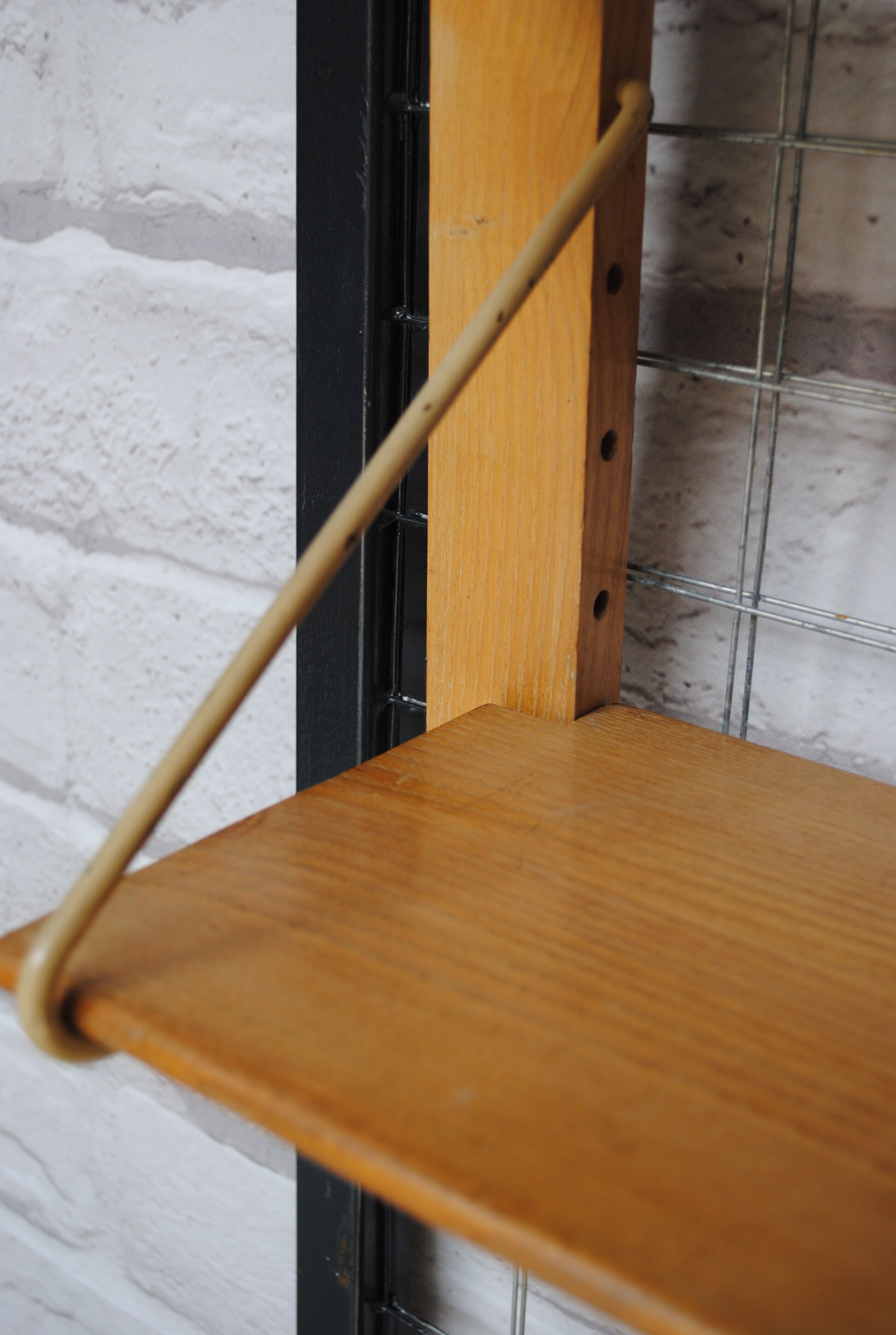 Wooden and metal wall shelf