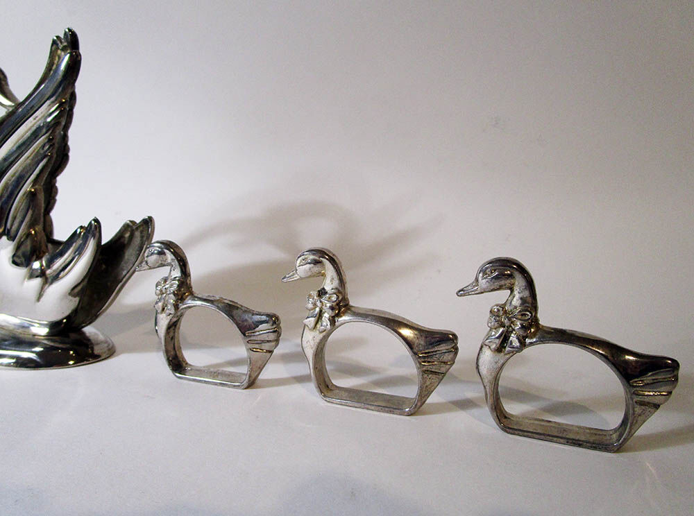 Paper towel holder with swans