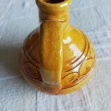 Glazed ocher round pitcher with handle