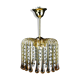 Suspension with tassels drops of water an glass