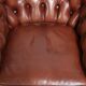 Cognac-coloured cow leather Chesterfield armchair in English style