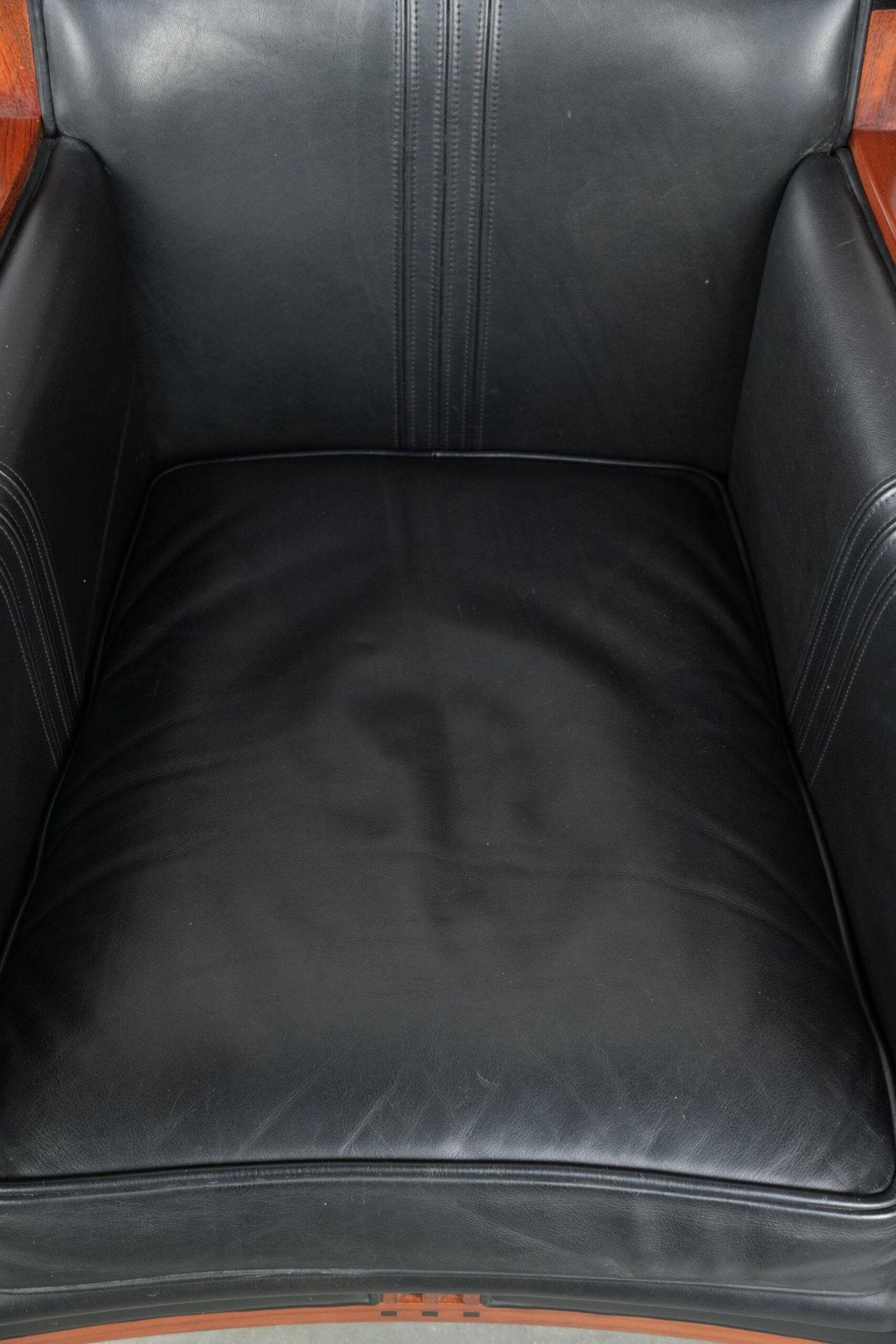 Black leather and wooden Art Deco design armchair