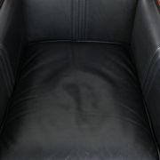 Black leather and wooden Art Deco design armchair