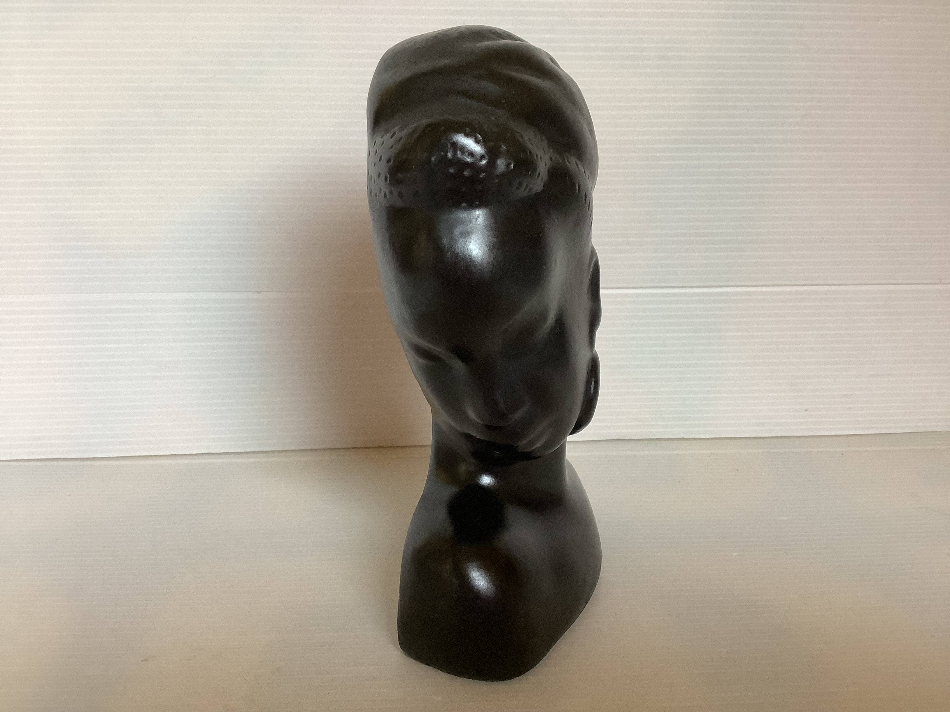 Antique bust of an African woman to stand or hang