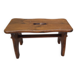 Old small vintage farm stool