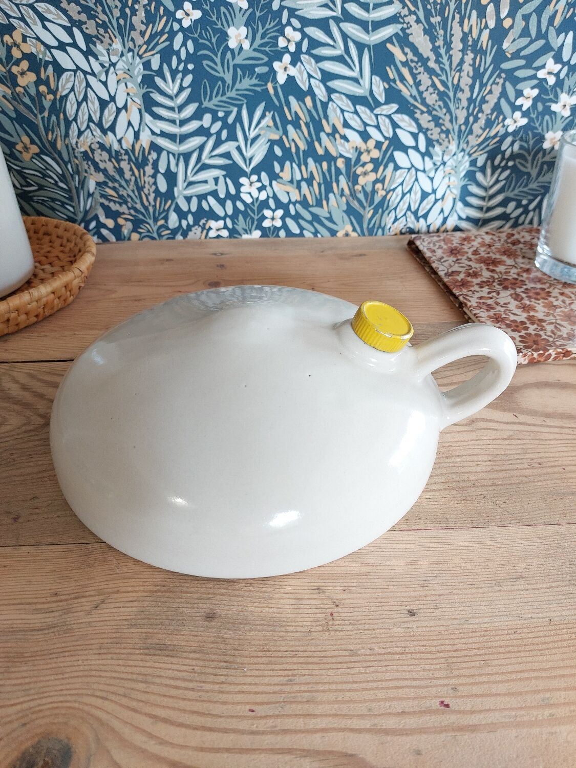 Vintage white enamelled stoneware bottle