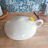 Vintage white enamelled stoneware bottle