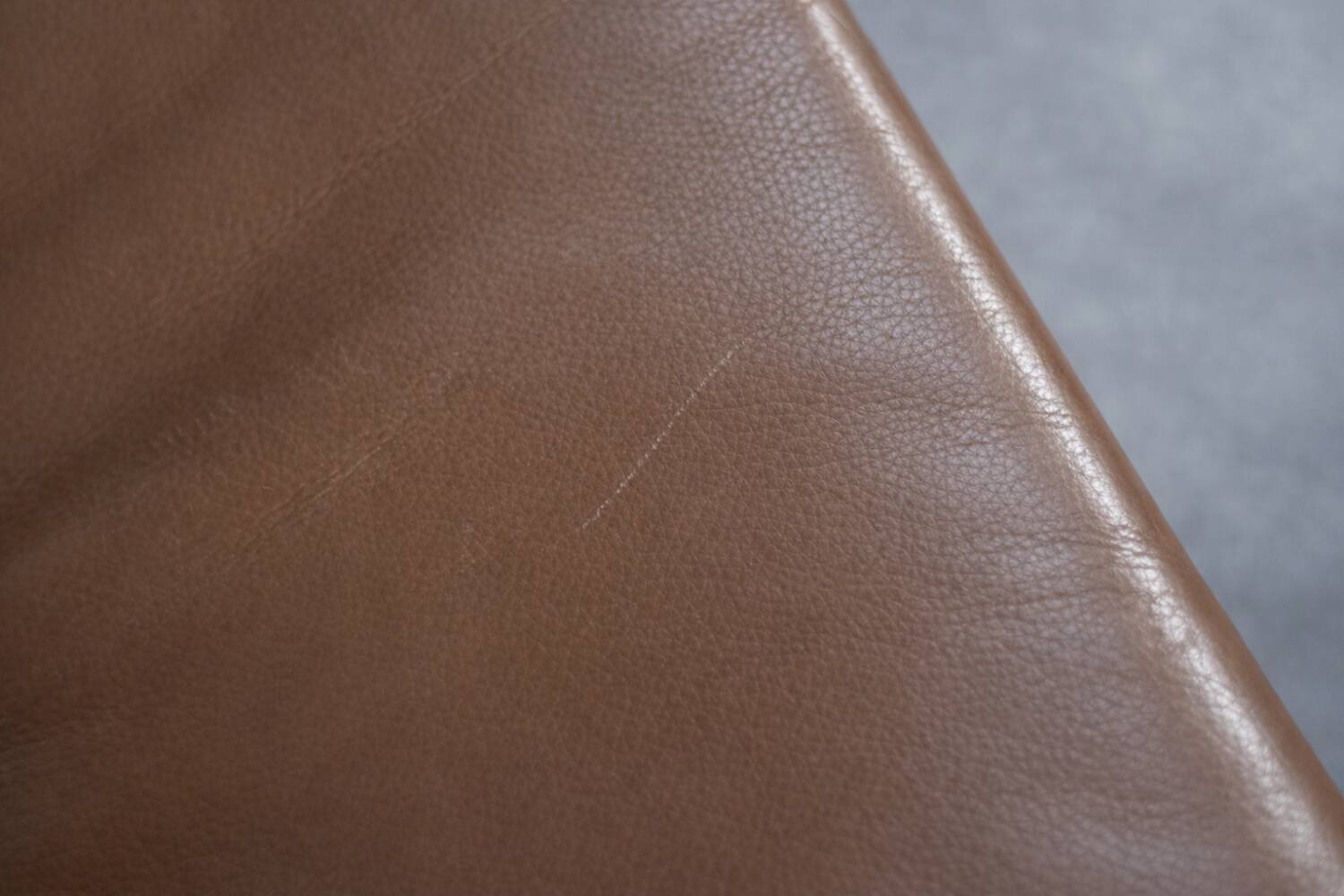 Vintage Mid-Century Danish Modern Brown Leather Swivel Chair and Ottoman