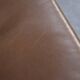 Vintage Mid-Century Danish Modern Brown Leather Swivel Chair and Ottoman