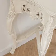 Console in Louis XV style, carved wood in off-white.
