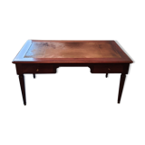 Mahogany desk on leather