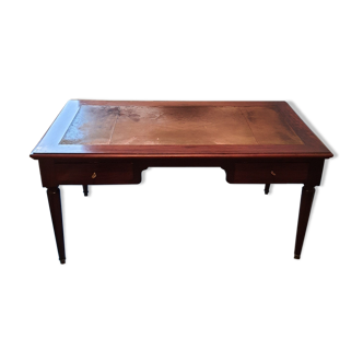 Mahogany desk on leather
