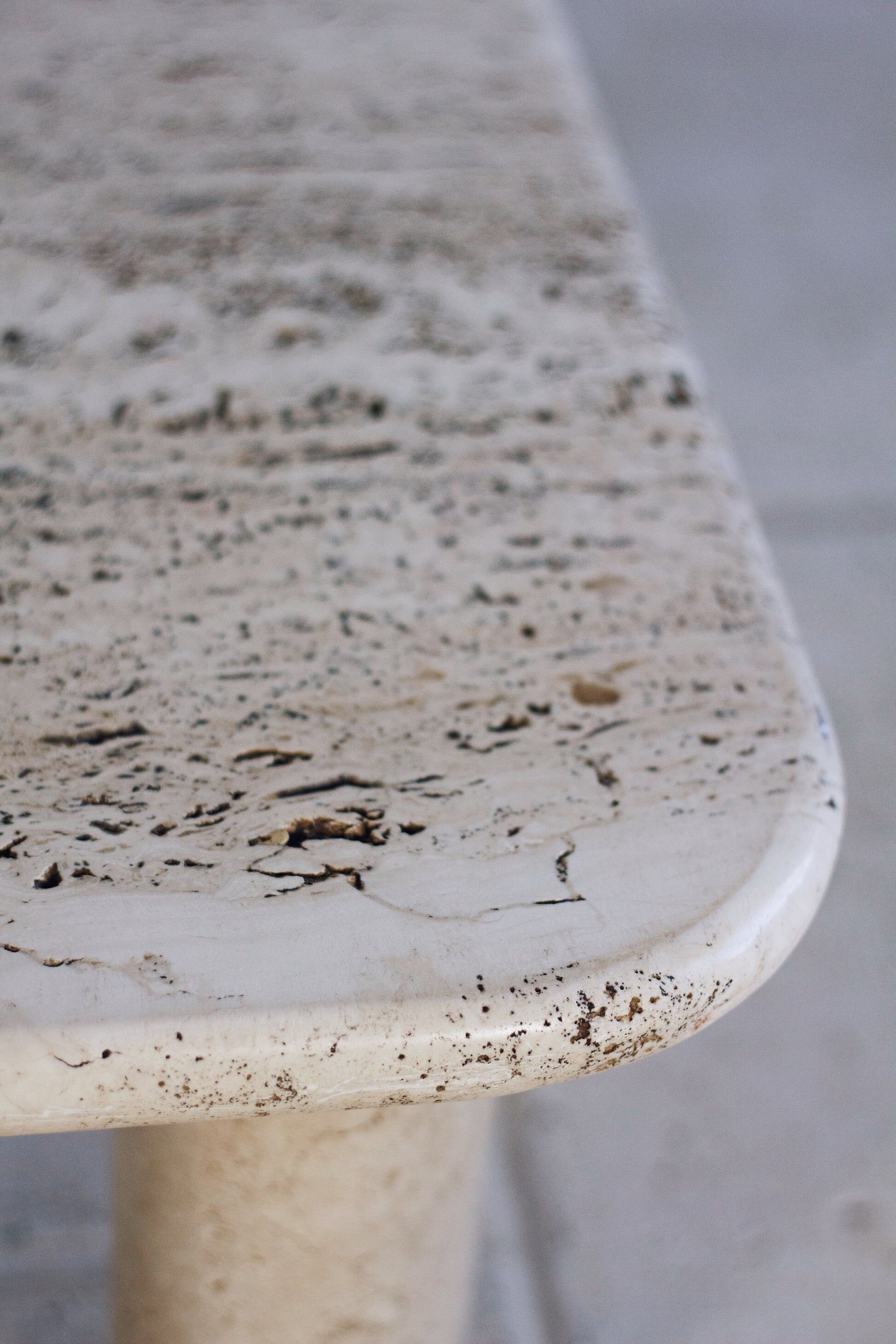 Travertine coffee table in the style of Angelo Mangiarotti, 1970.