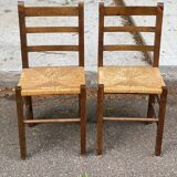 2 solid wood and straw chairs