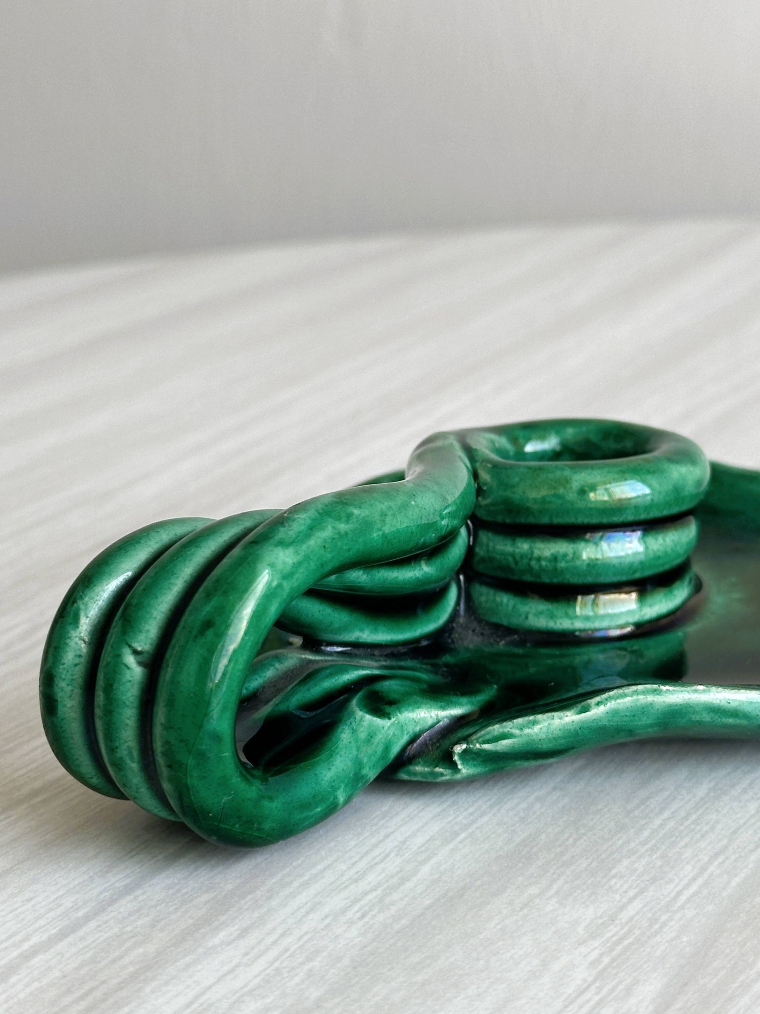 Vintage green glazed ceramic candle holder, organic design.
