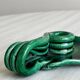 Vintage green glazed ceramic candle holder, organic design.