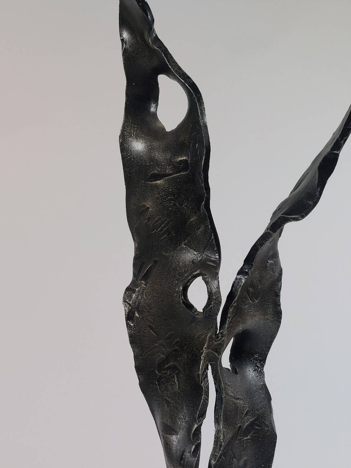 Sculptural brutalist floor candle holder made of hand-forged iron from the 1950s.