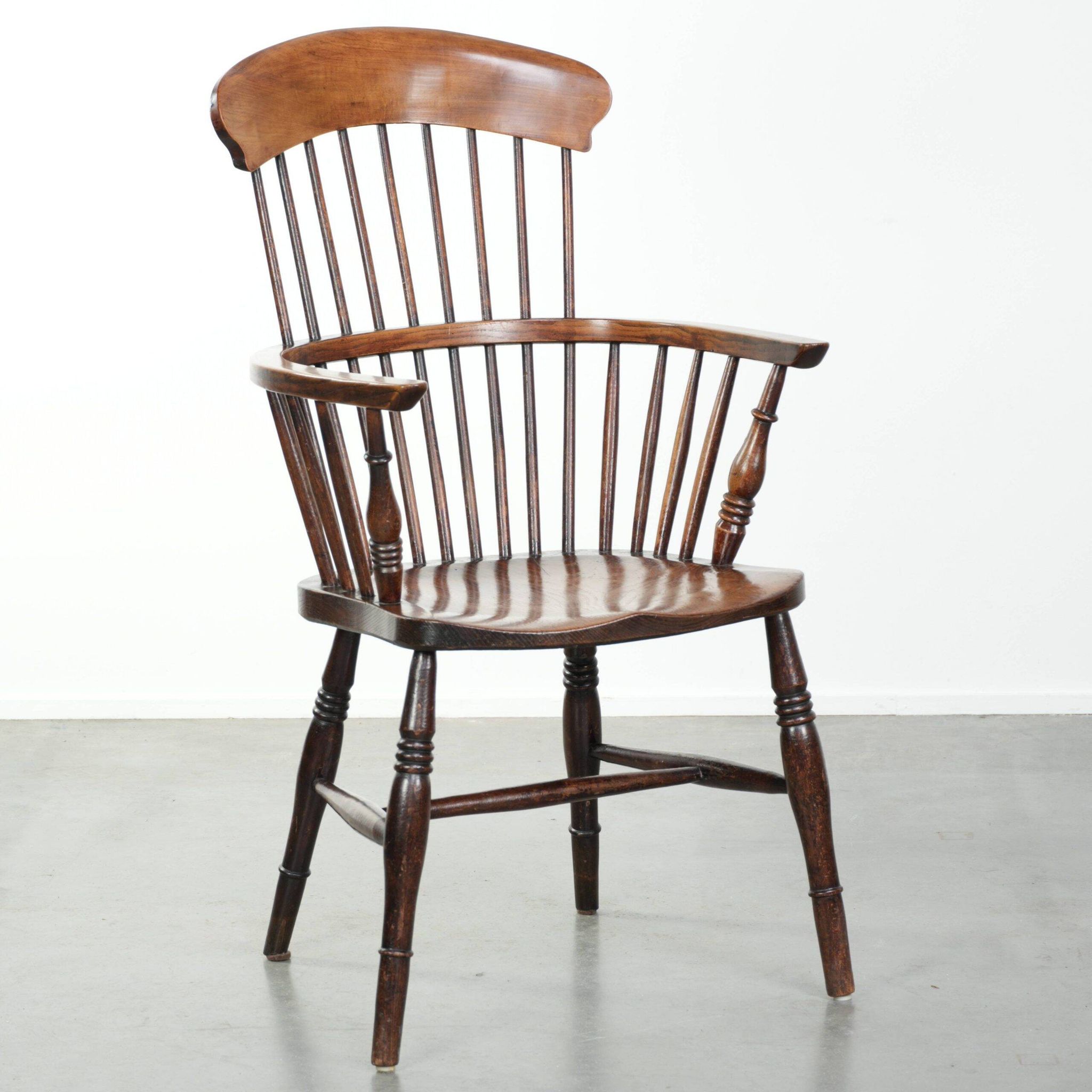 Antique English Windsor highback chair from the 19th century