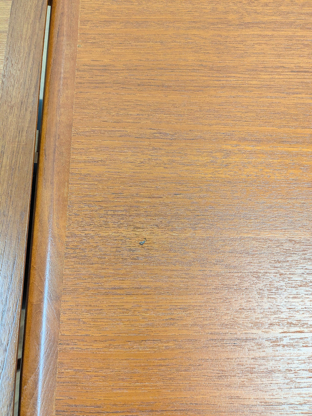 Teak dining table