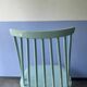 Chaise bâton blanche « Mademoiselle » du Finlandais Ilmari Tapiovaara
