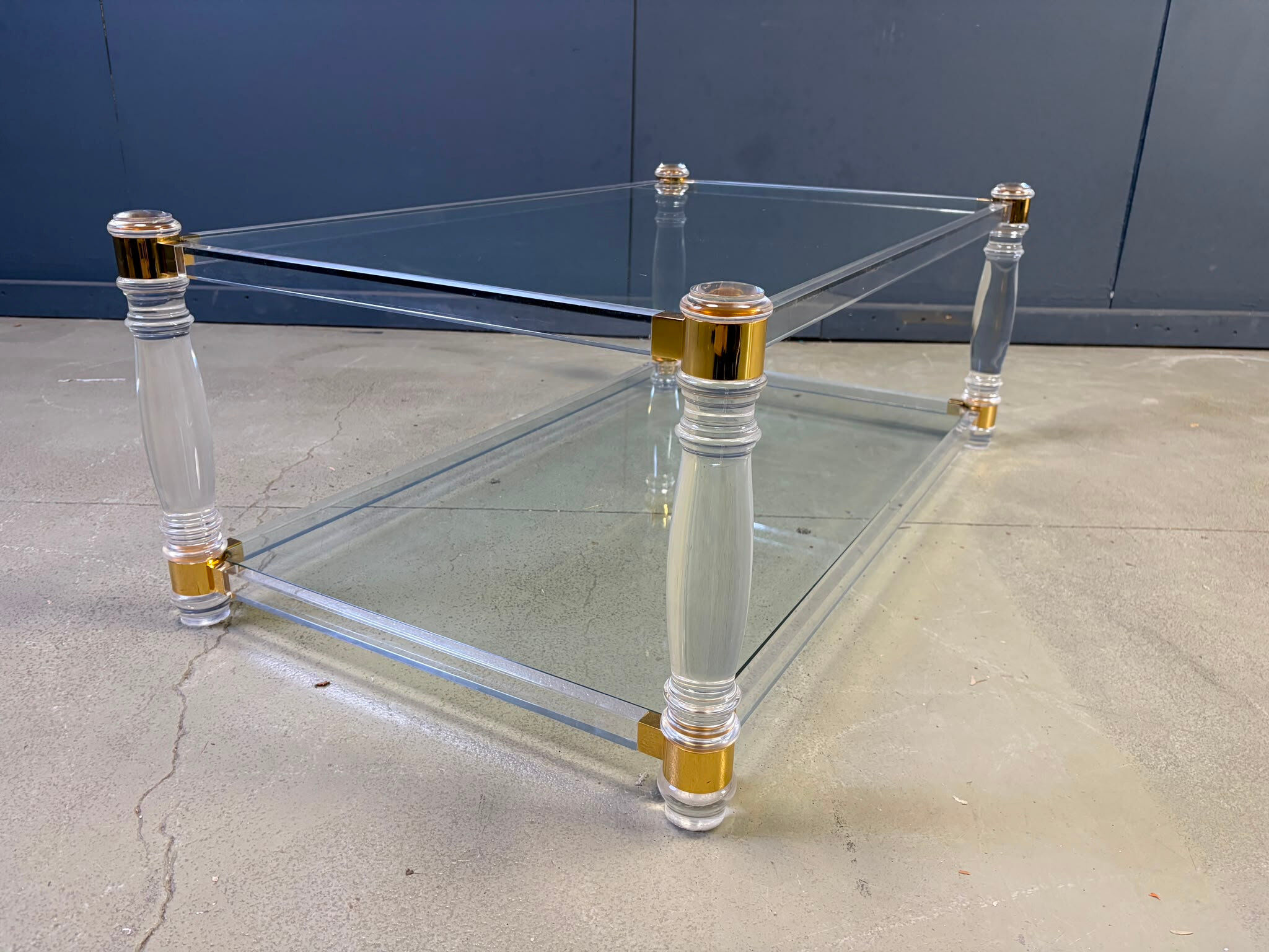 Vintage lucite and brass coffee table, 1970s