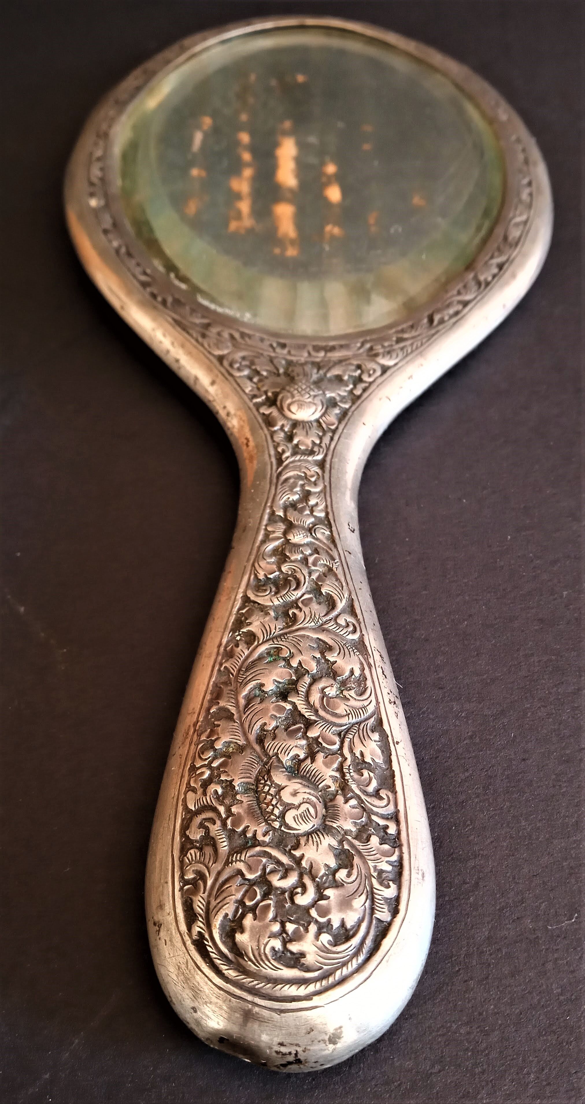 Silver beveled hand mirror