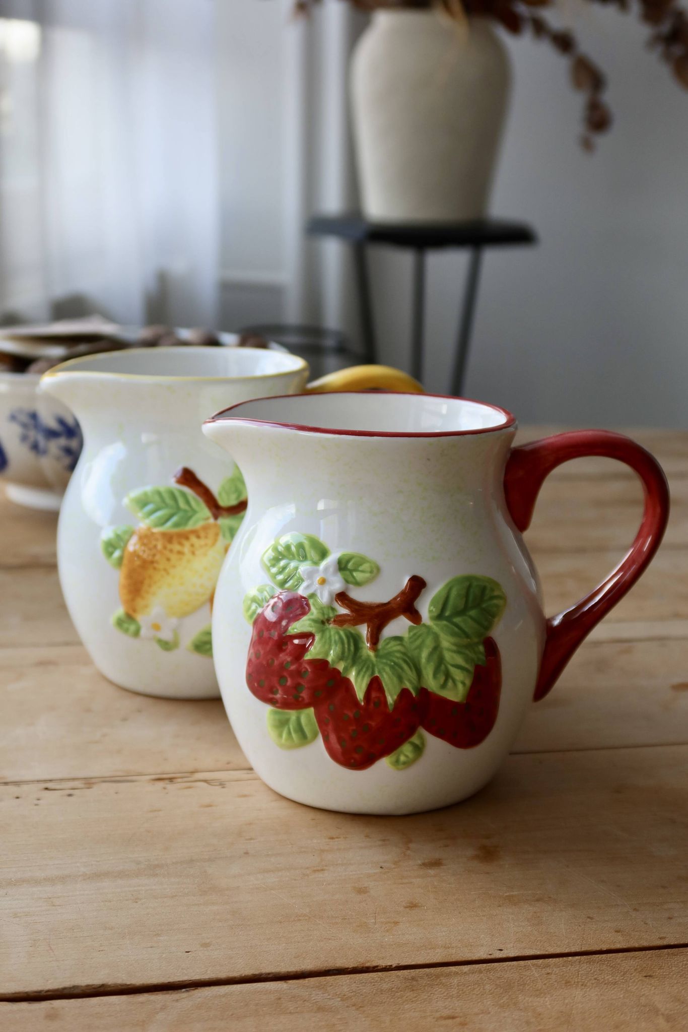 Vintage earthenware and slip pitcher with lemon motif