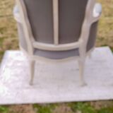 Bergère armchair with blue striped seat and back