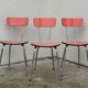 Red formica chairs 1950