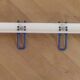White and blue lacquered steel wall coat holder