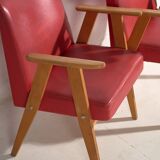 2 red armchairs, circa 1960