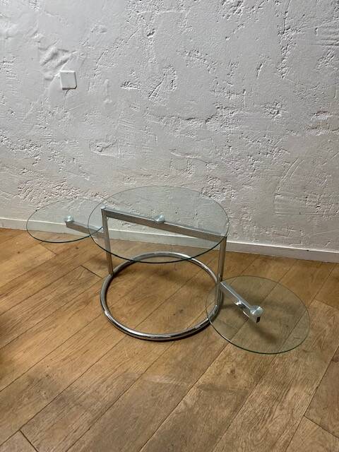 Glass coffee table with 2 swivel tops