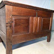 Rustic antique oak chest, original fittings and moulded panels.