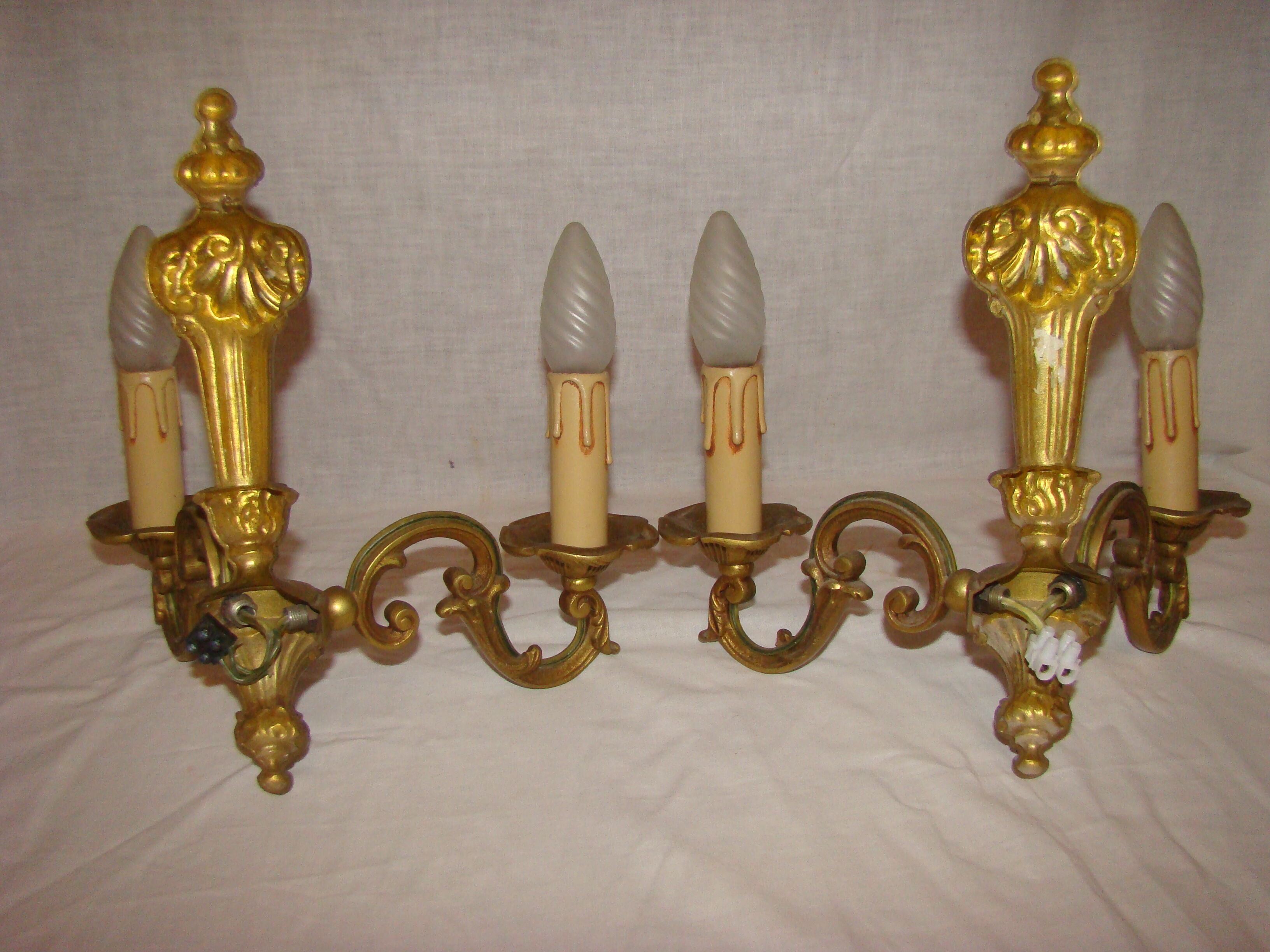 pair of bronze wall lights with 2 arms