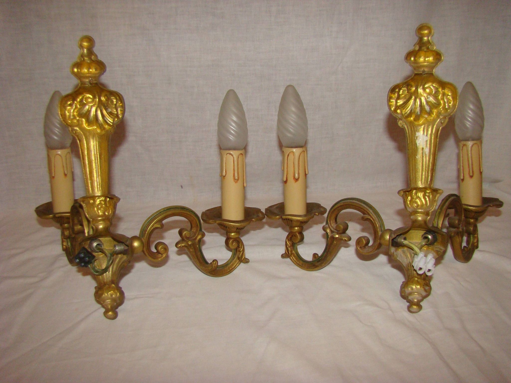 pair of bronze wall lights with 2 arms
