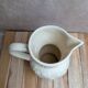 Vintage ivory earthenware jug – relief fruits