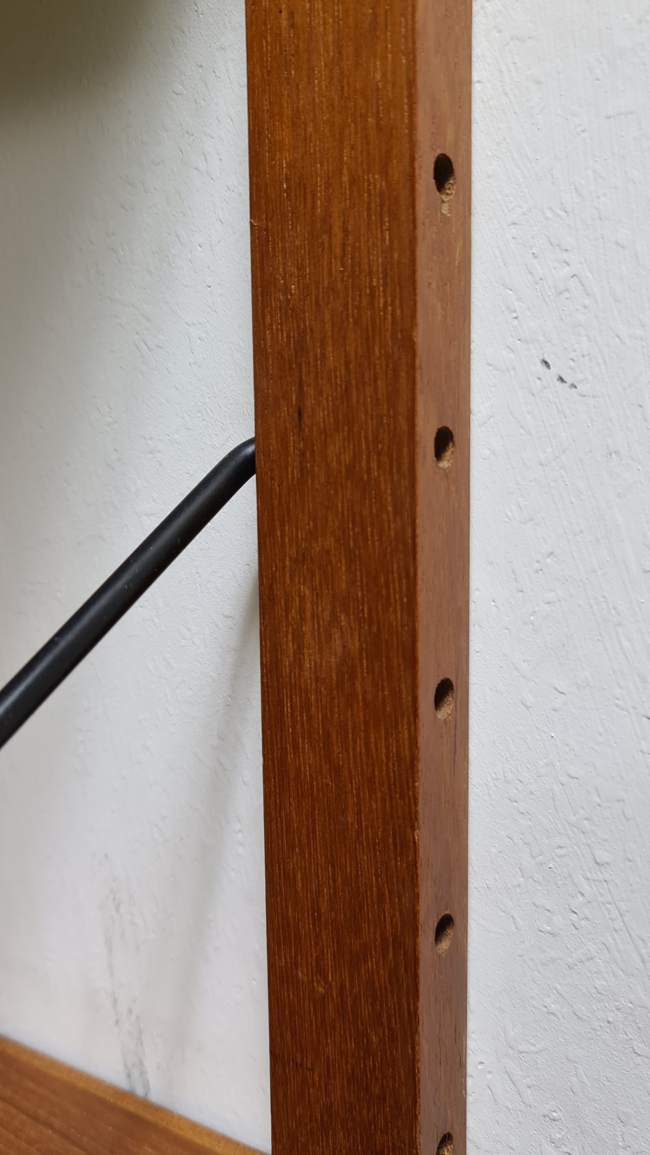 Vintage teak shelving by Poul Cadovious