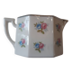 Pot à lait vintage au décor rose et bleu en porcelaine de Limoges signé.